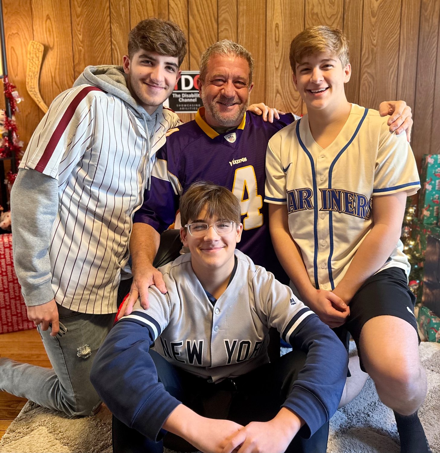 Dave Stevens with his three sons, Brady, 19, (l), Luke, 14, (center front) and Tate, 16 (r)